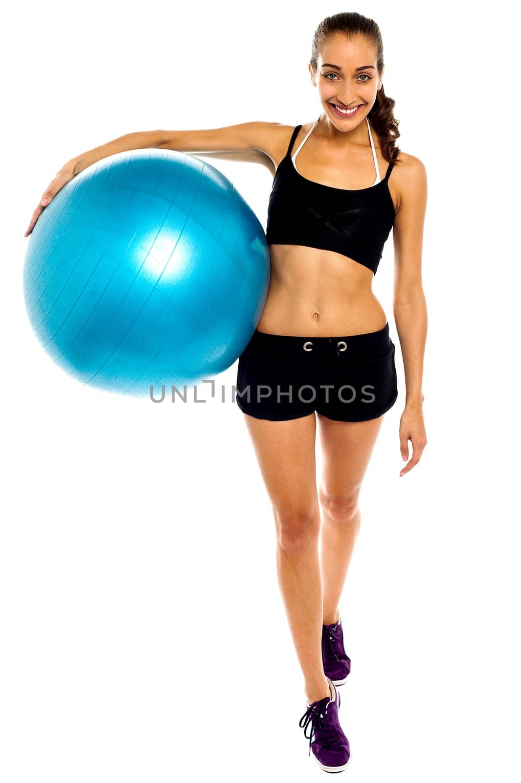 Beautiful young healthy lifestyle woman with pilates exercise ball. Isolated over white