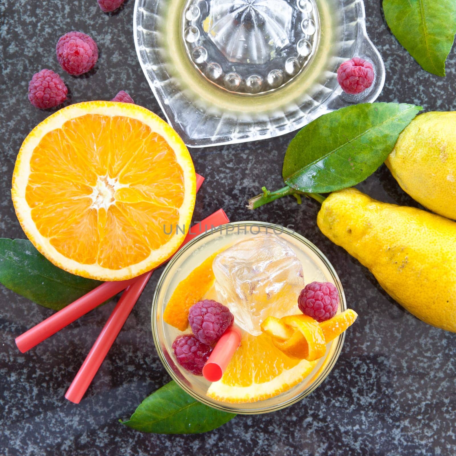Lemonade in glazes of fresh lemons and oranges with ice cream
