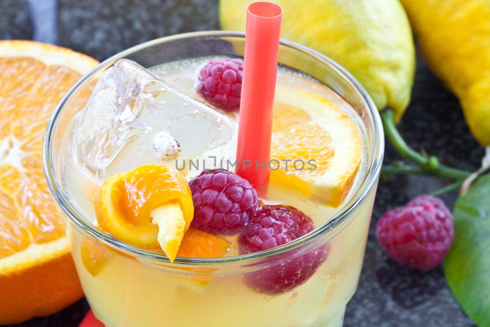 Lemonade in glazes of fresh lemons,oranges and raspberries with ice cream