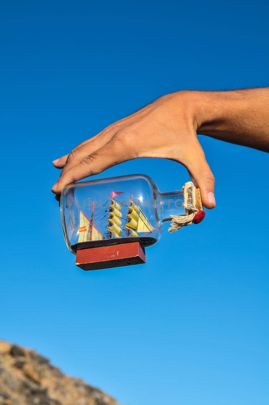 Sailing Boat Vintage Vessel on a Caucasian Hand