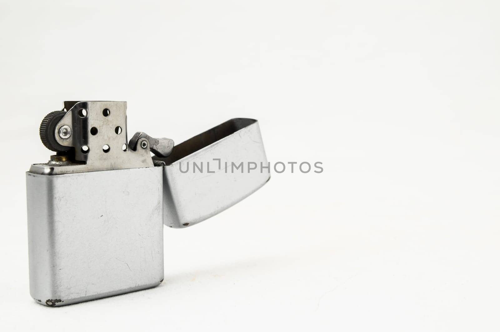 Vintage Zippo Style Lighter On a White Background