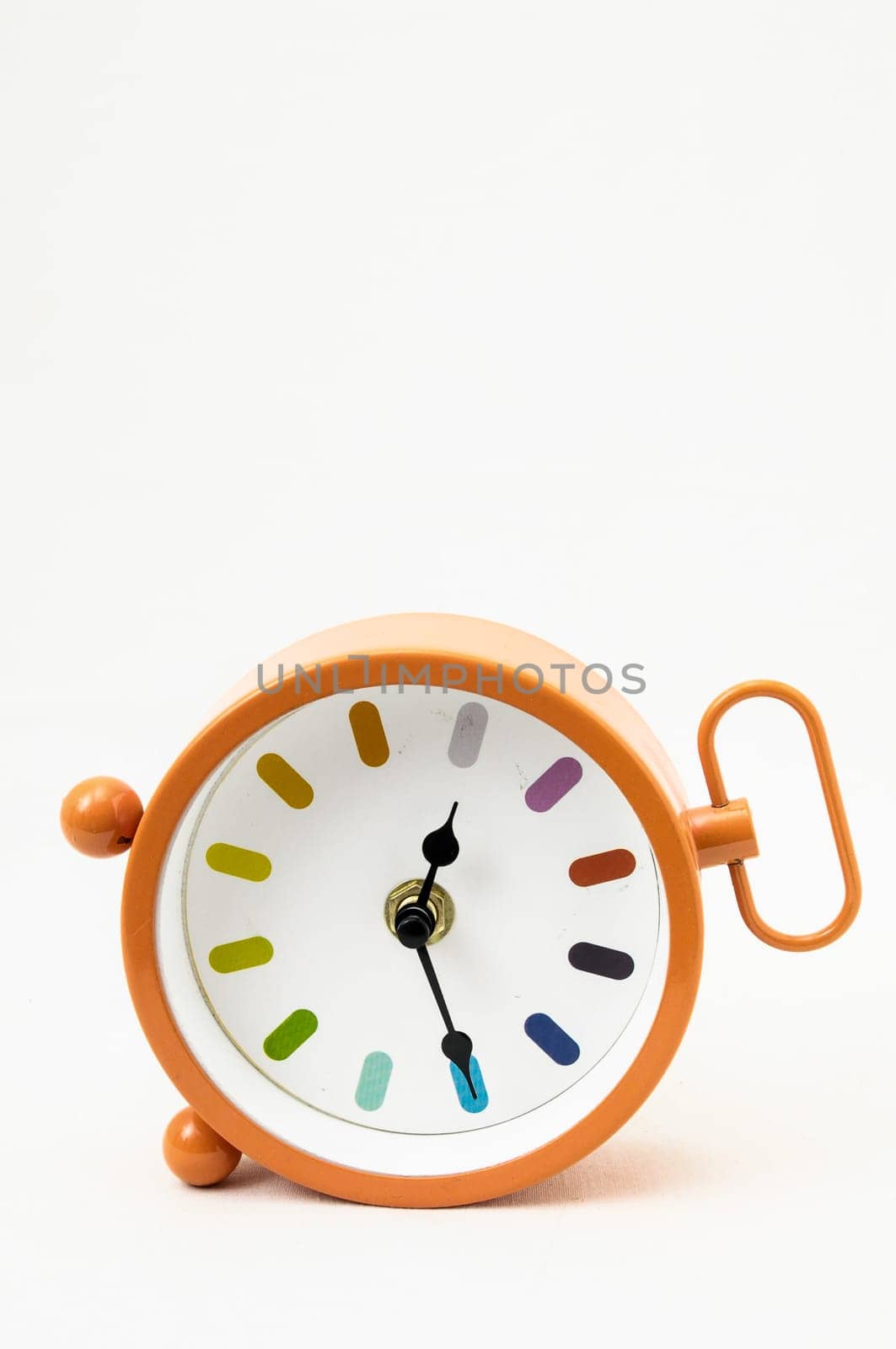 Orange Alarm Clock on a White Background