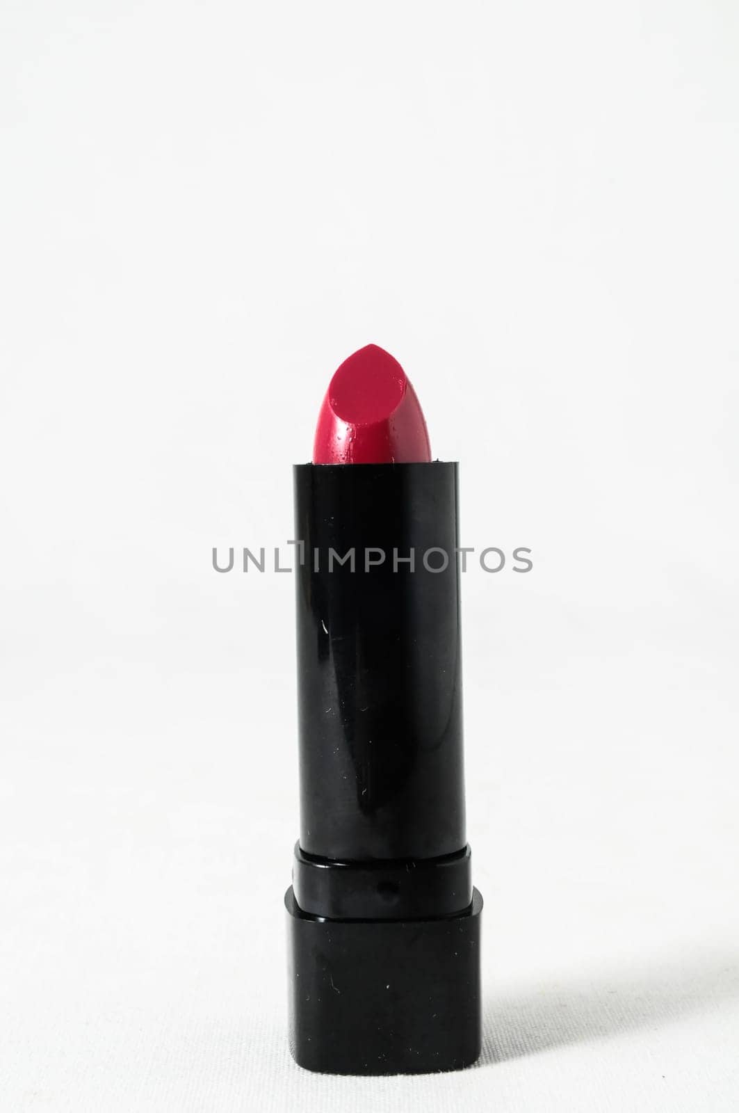 Lipstick in Black Container on a white background