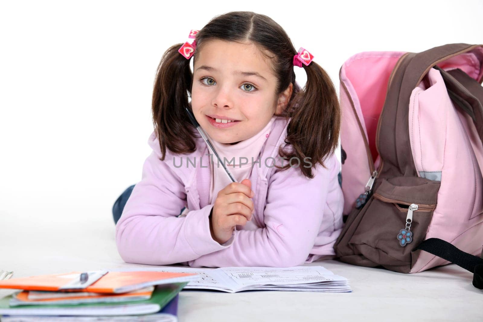 Little schoolgirl with backpack