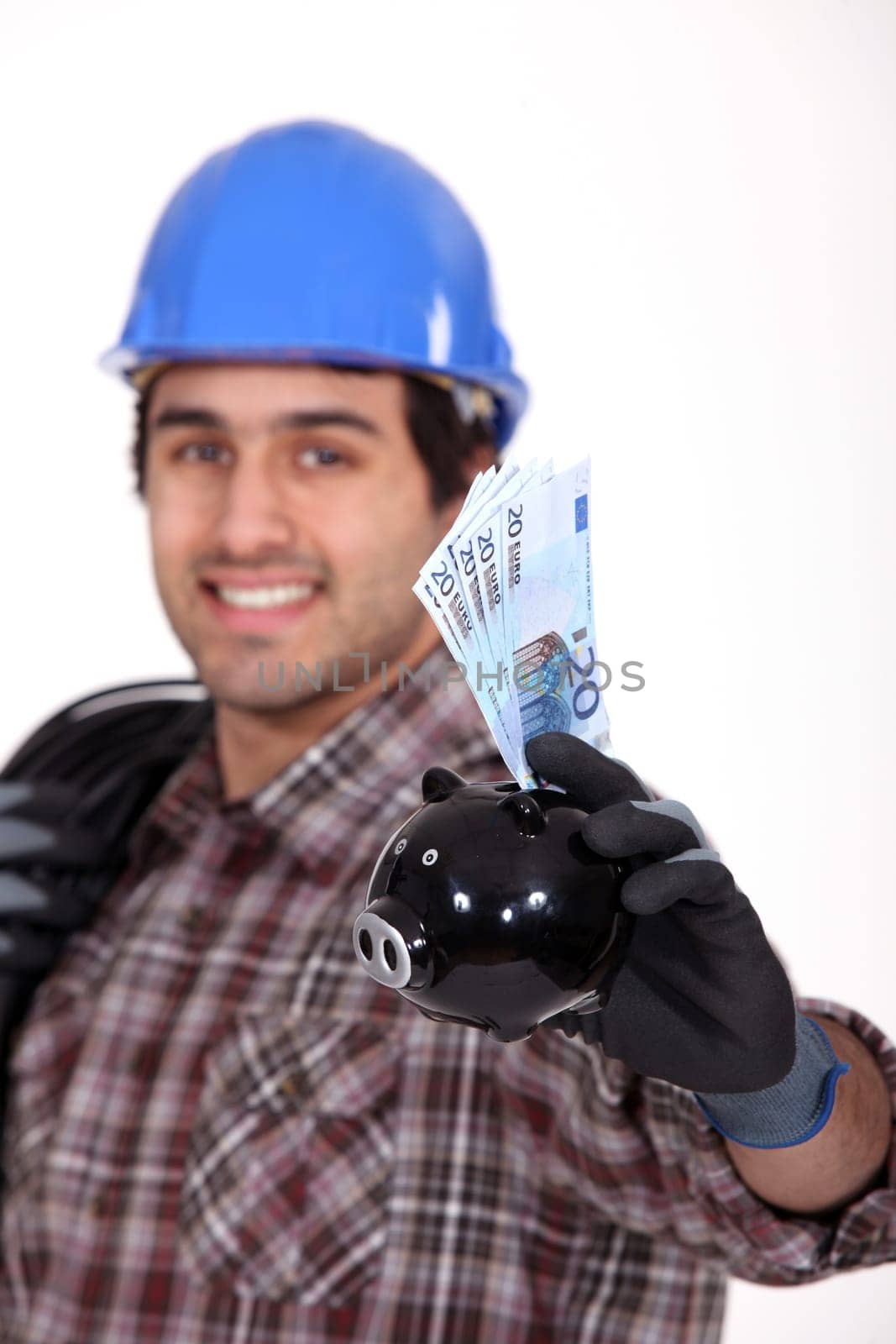 Entrepreneur showing piggy bank