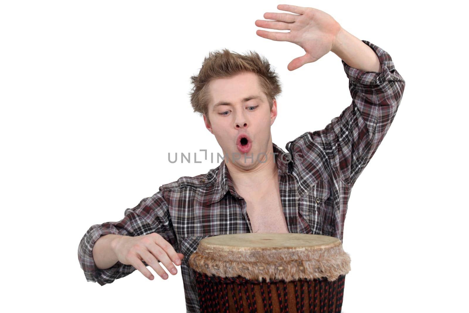 Enthusiastic man playing the bongo drum