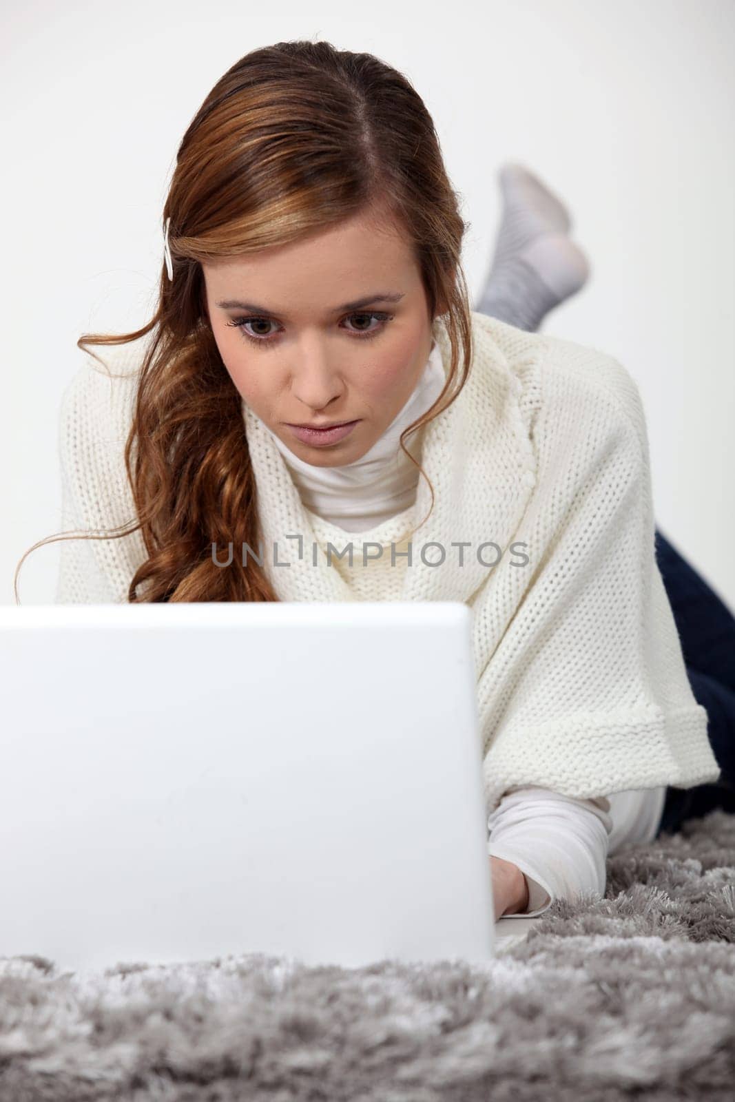 Young woman concentrating on her work