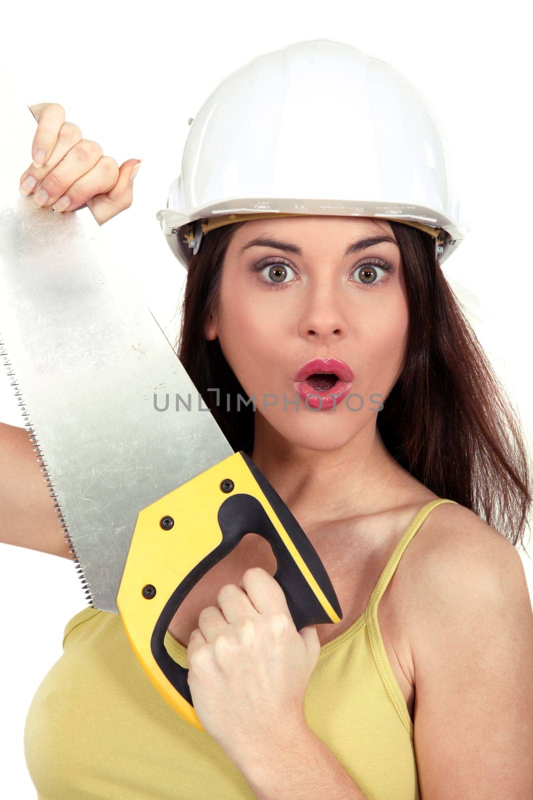 Surprised woman with a handsaw