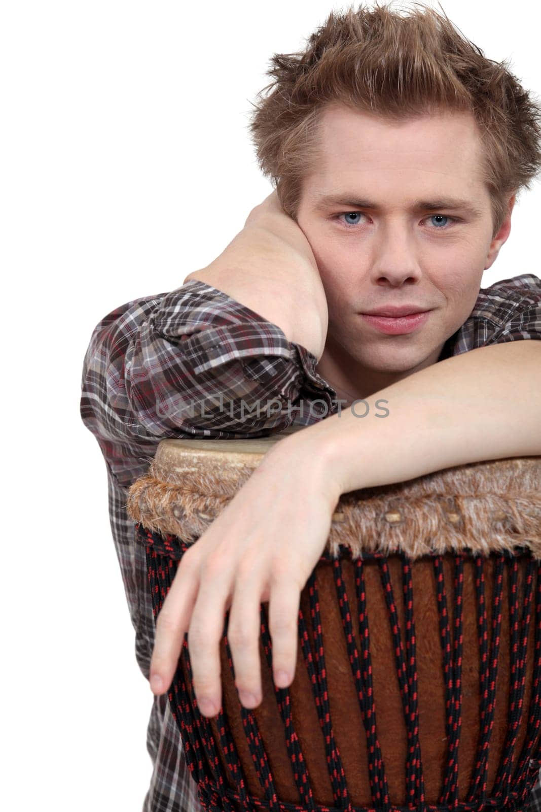 Man sat with bongo drum