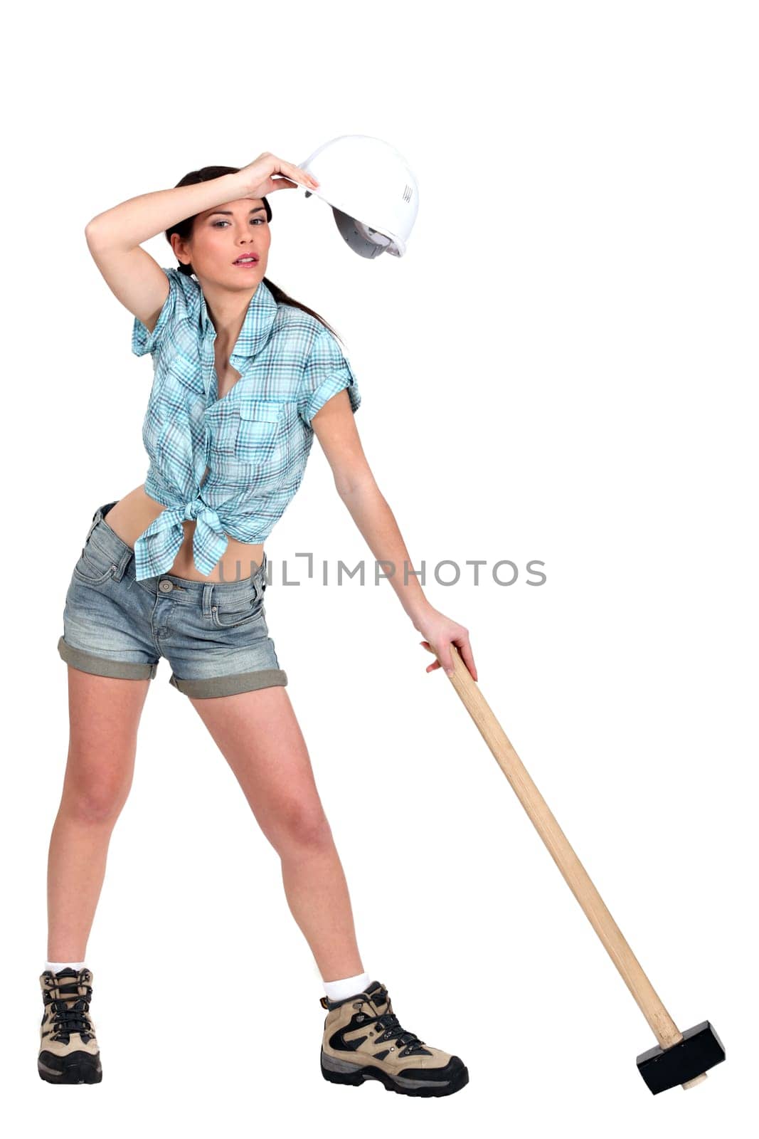 Tired female construction worker
