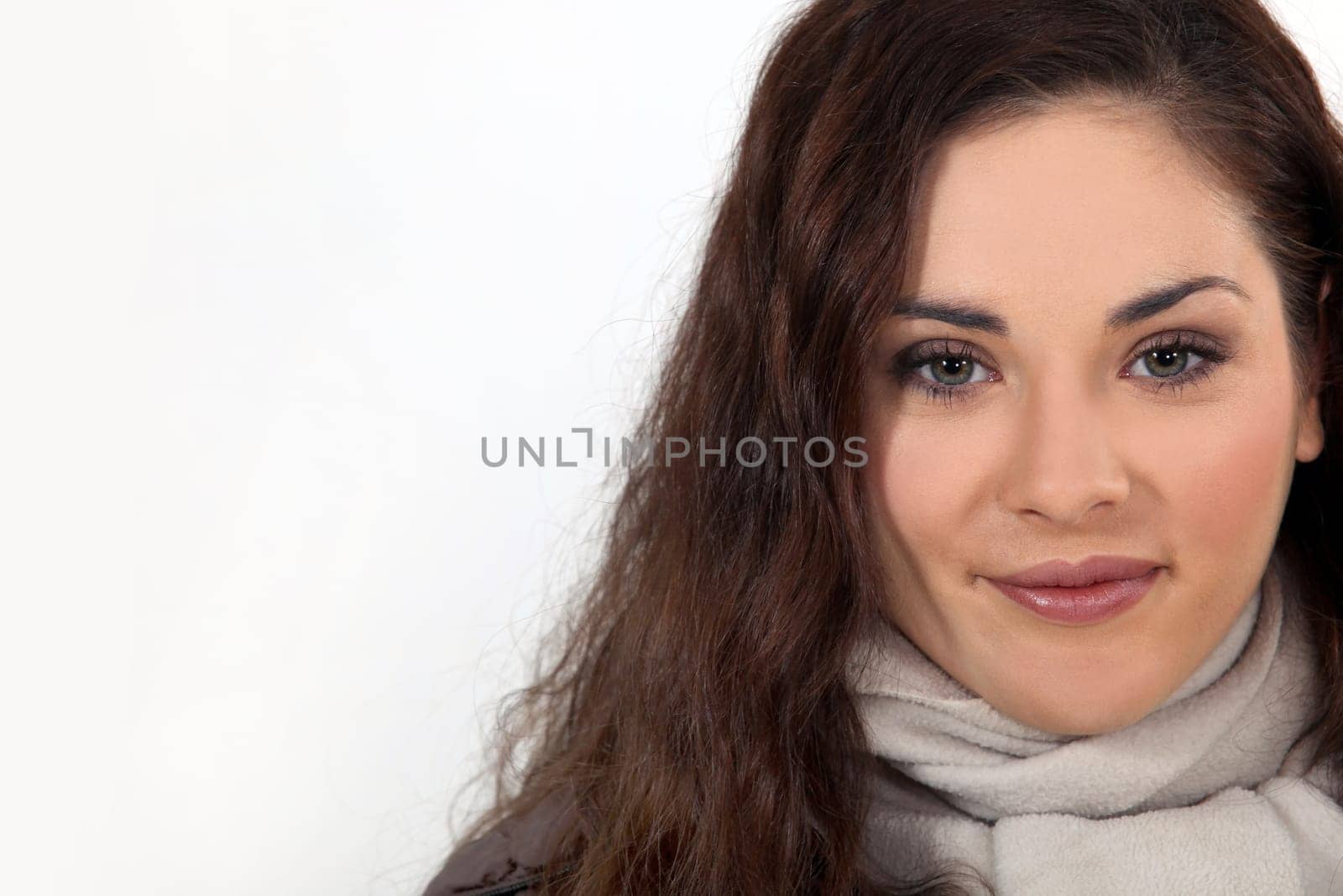 Brunette in studio wearing scarf