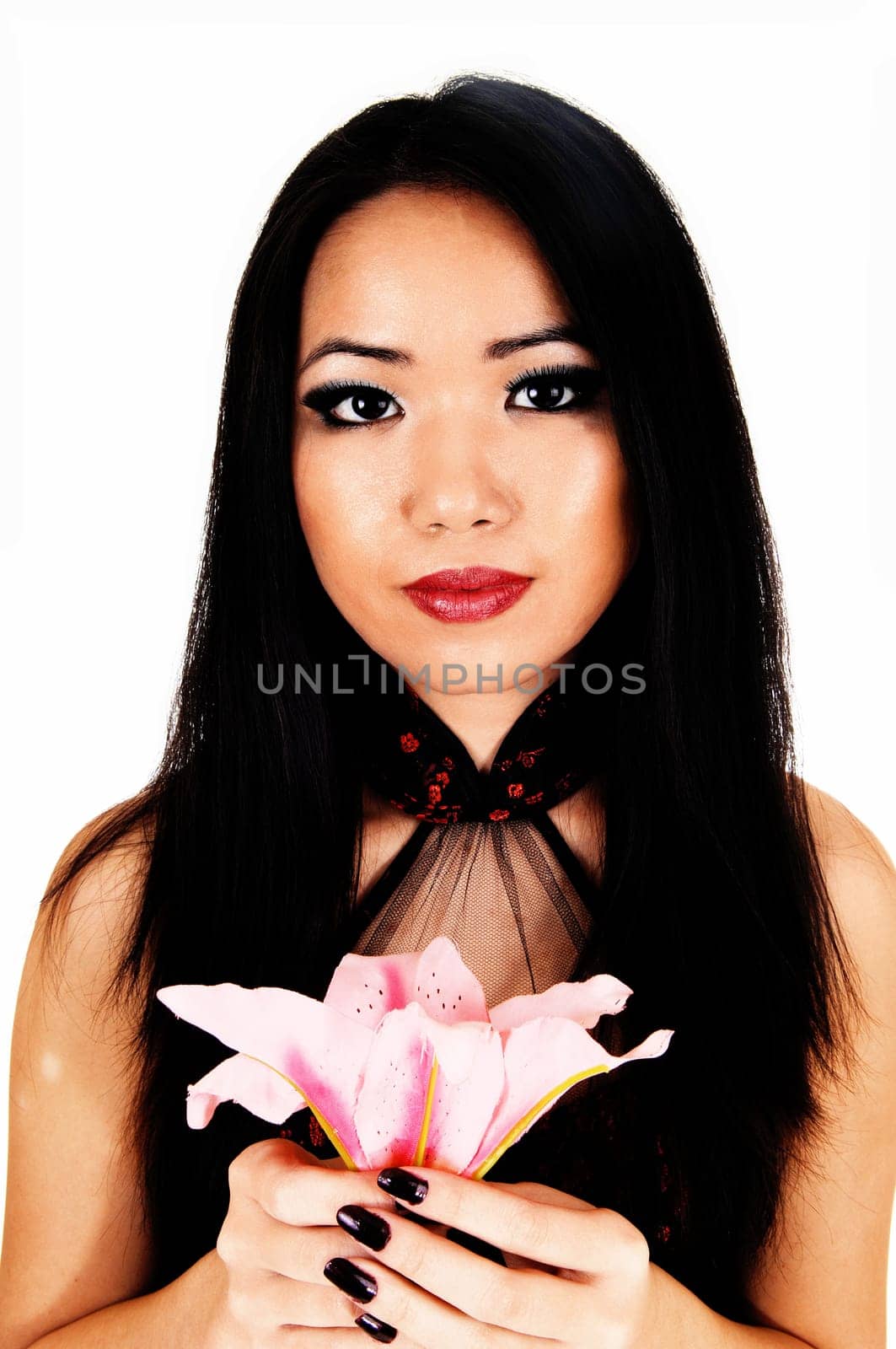 A beautiful young Chinese woman with long black hair in a portrait picture.holding a pink lily for white background..