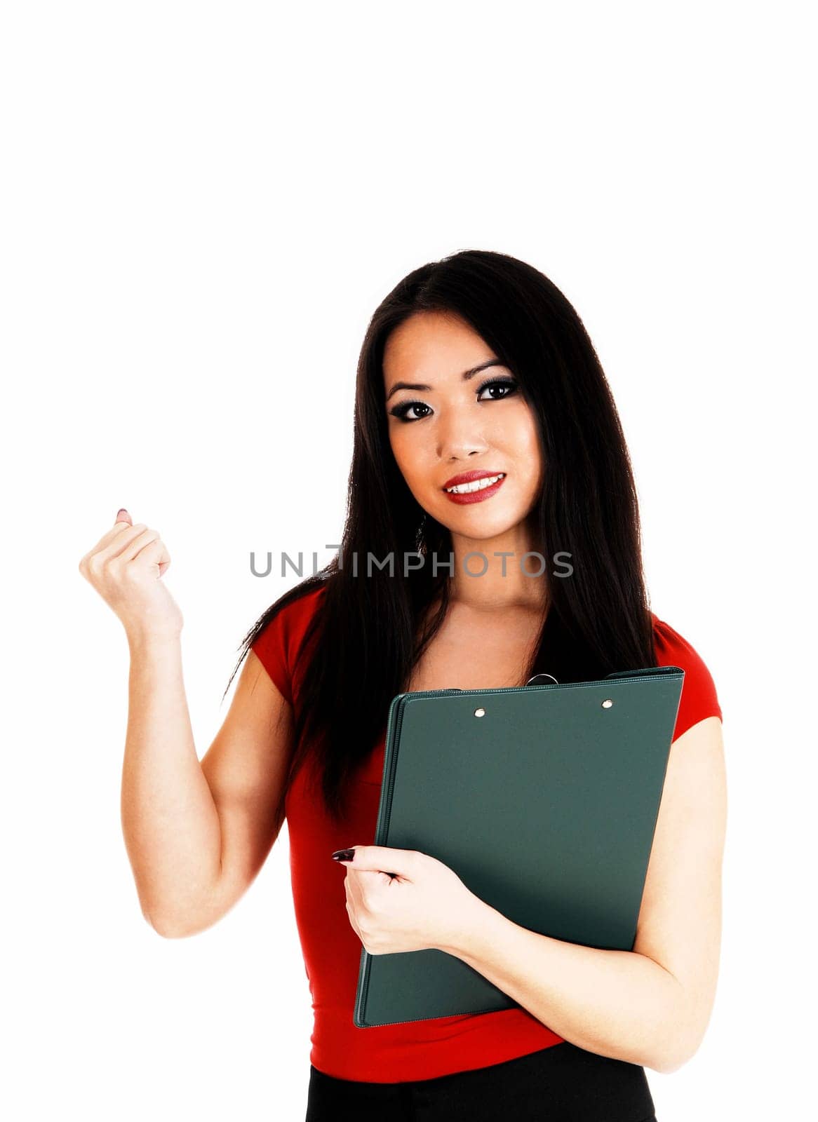 A beautiful young slim Asian business woman in red sweater and.long black hair standing for white background..