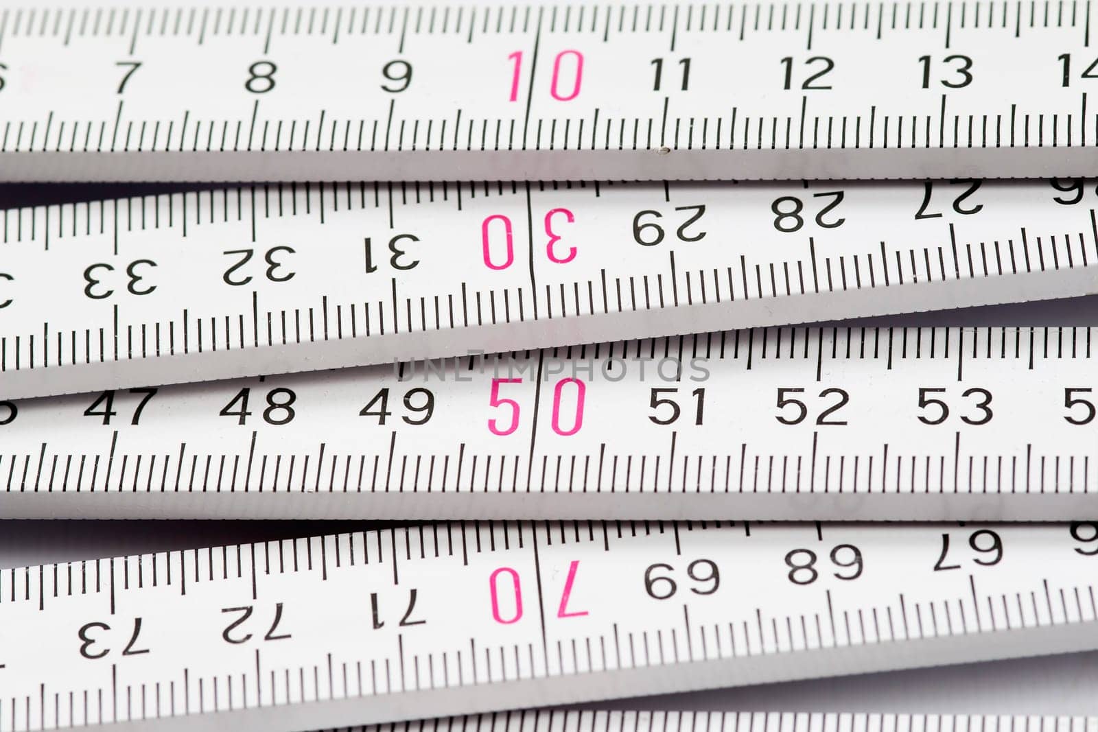 Detail of the folding meter rule - measure twice, cut once