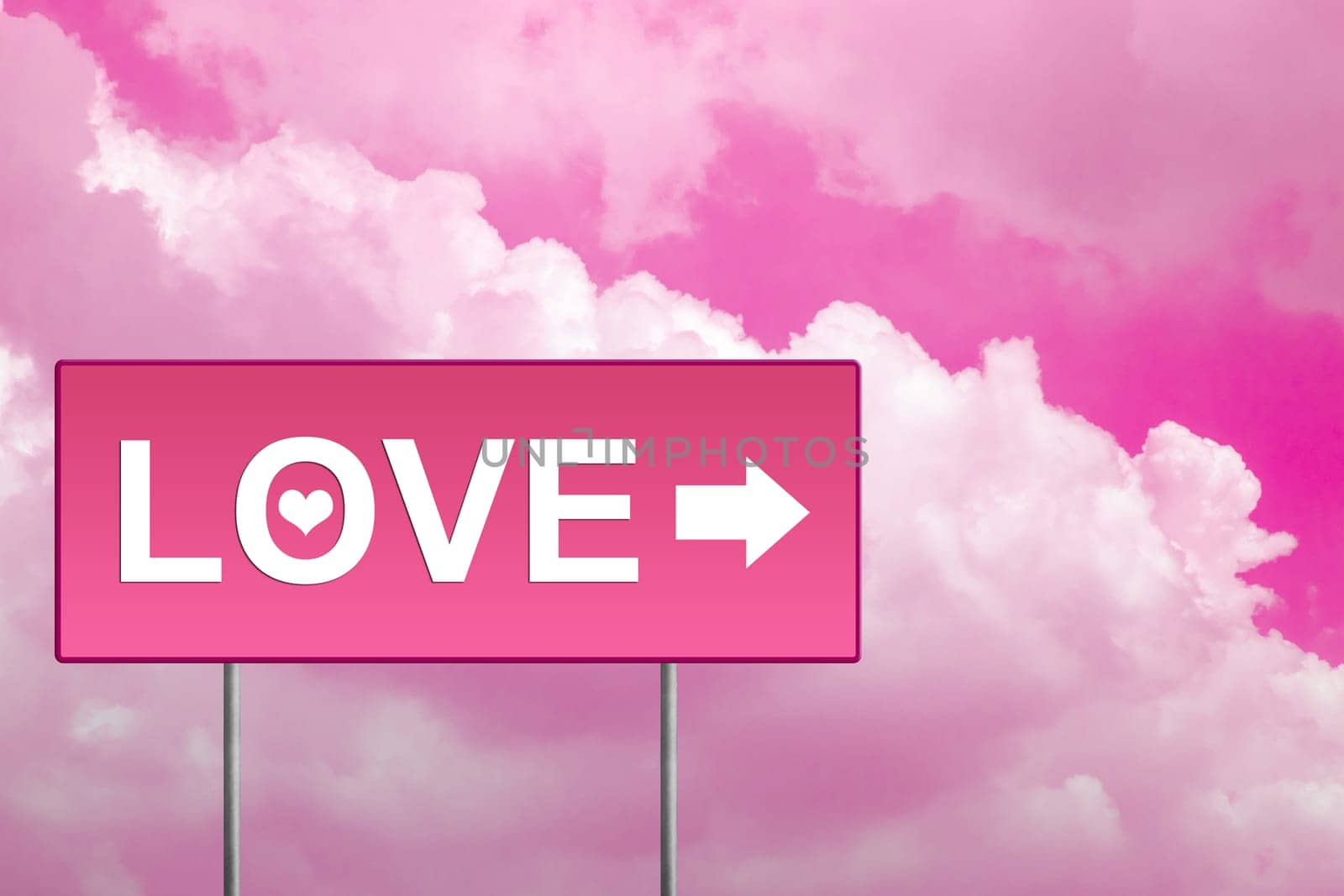 love on pink road sign with sky