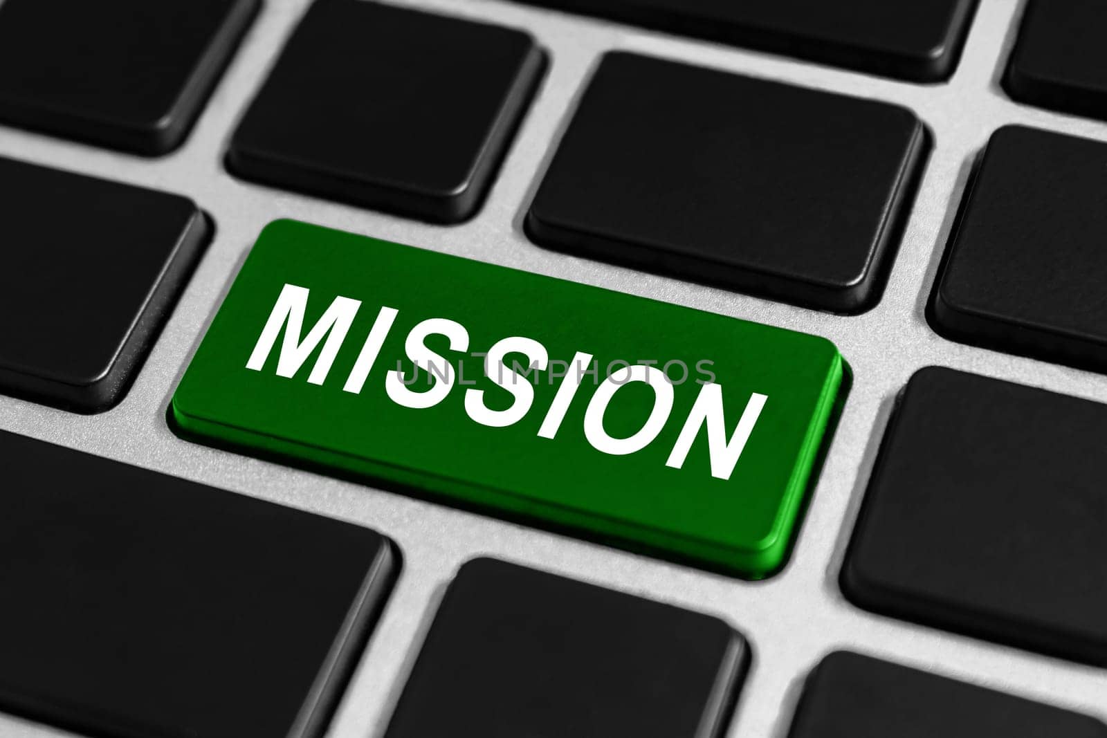 green mission button on keyboard, business concept