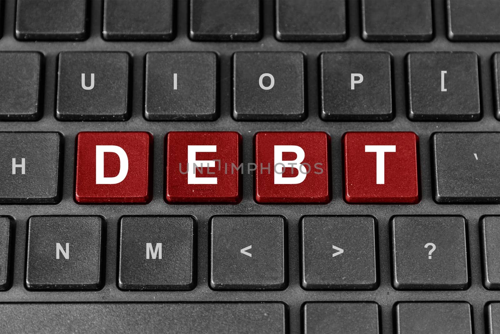 Debt red word on keyboard