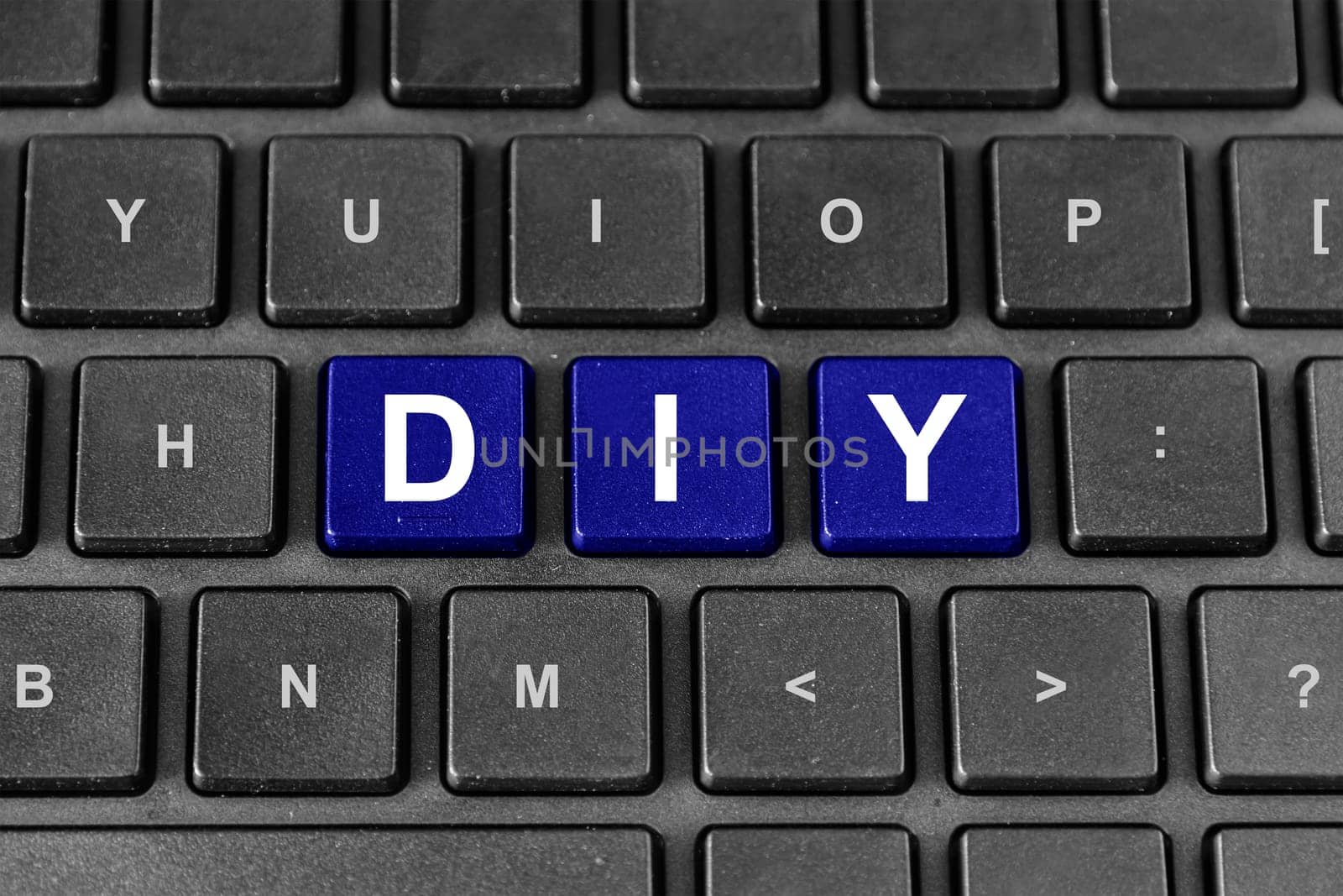 DIY or Do It Yourself blue word on keyboard