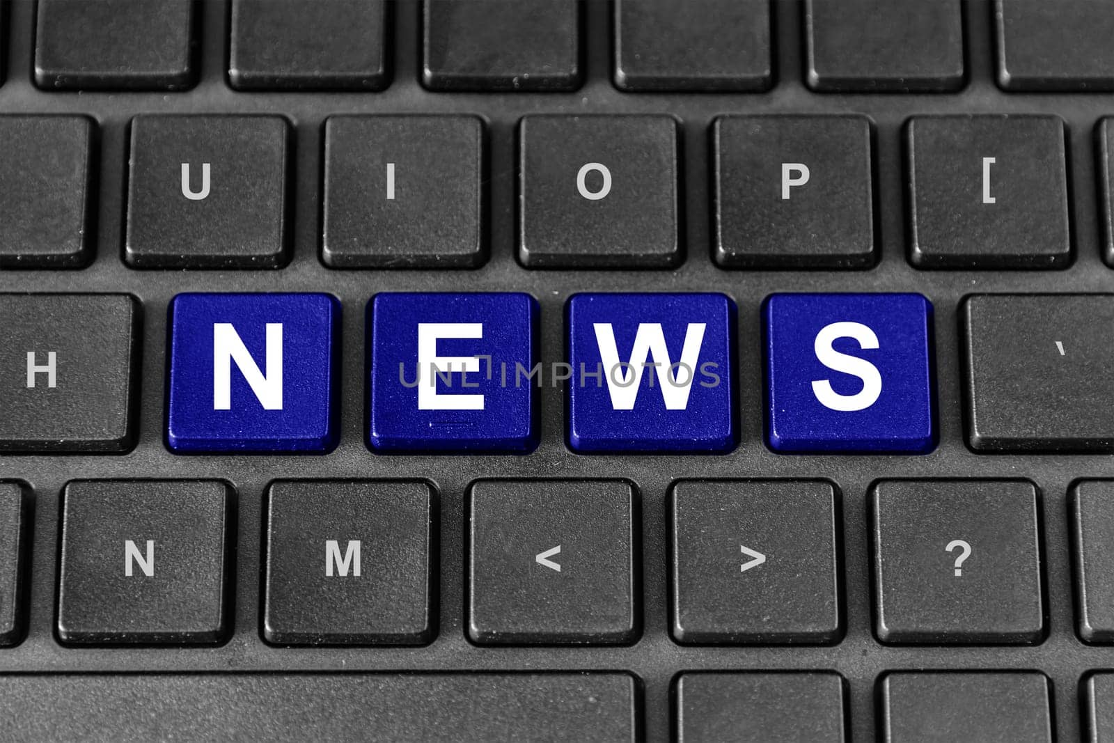 News blue word on keyboard
