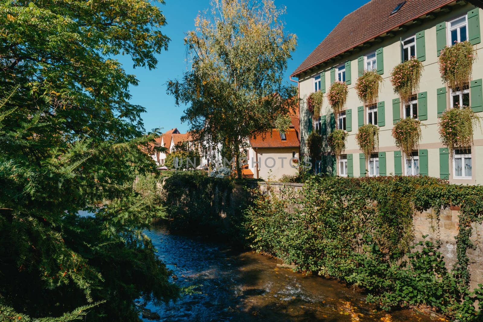 Old national German town house. Old Town is full of colorful and well preserved buildings. Baden-Wurttemberg is a state in southwest Germany bordering France and Switzerland. The Black Forest, known for its evergreen scenery and traditional villages, lies in the mountainous southwest. Stuttgart, the capital, is home to Wilhelma, a royal estate turned zoo and gardens. Porsche and Mercedes-Benz have headquarters and museums there. The 19th-century Hohenzollern Castle sits in the Swabian Alps to the south.