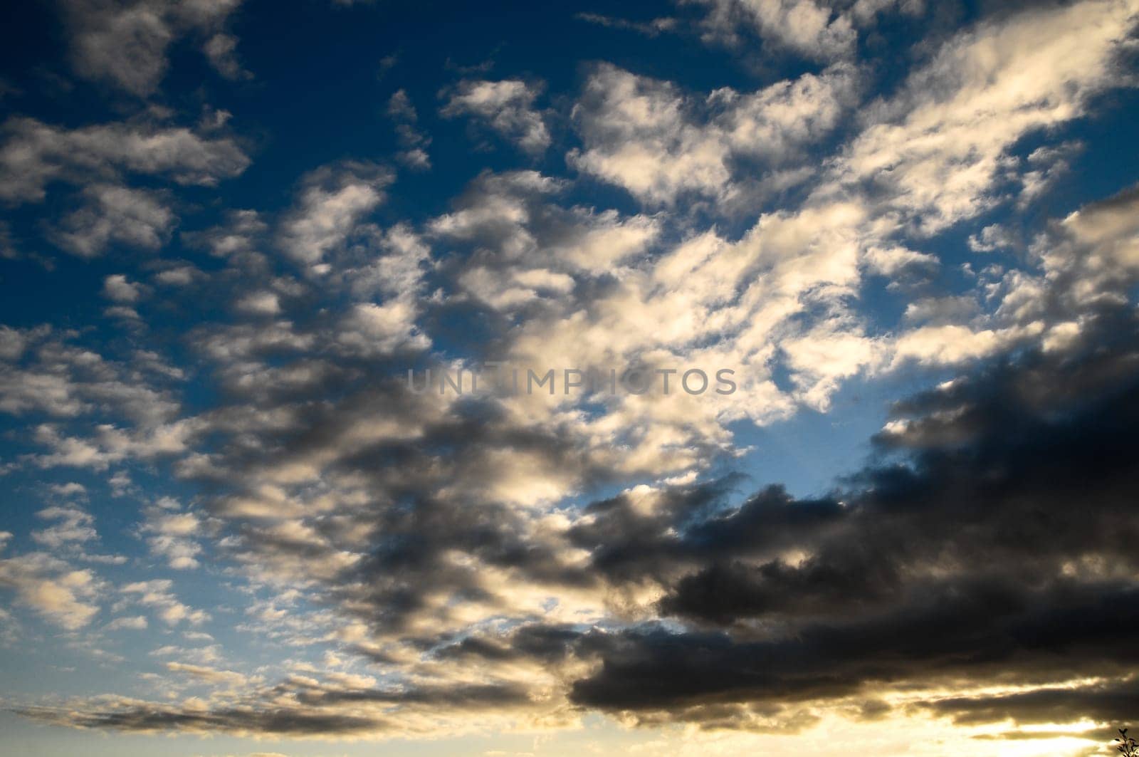 Cloudscape, Colored Clouds at Sunset near the Ocean