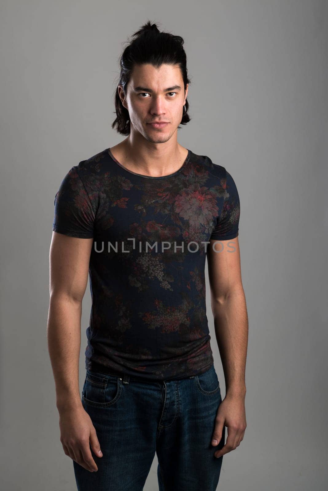 Portrait of handsome Malaysian man wearing flowery top