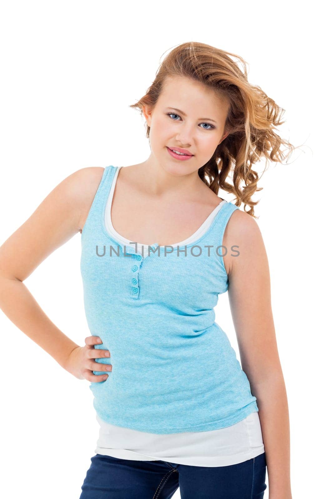 Blonde girl teen with blue eyes and blue shirt laughing portrait isolated