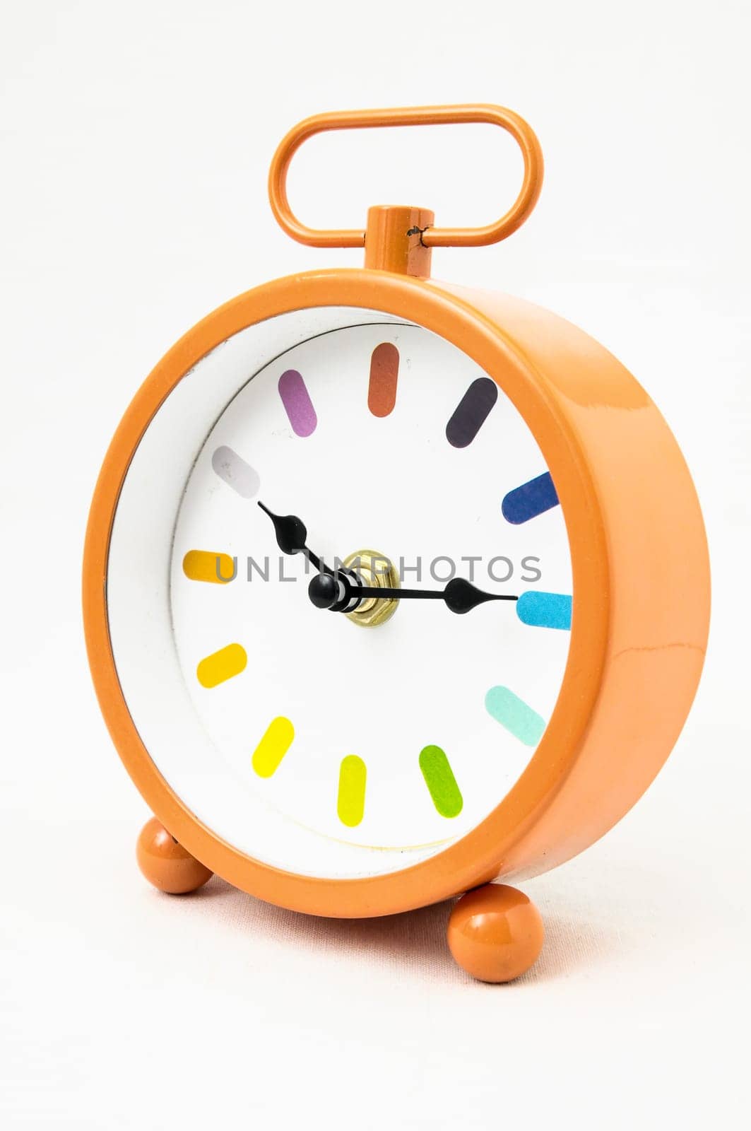 Orange Alarm Clock on a White Background