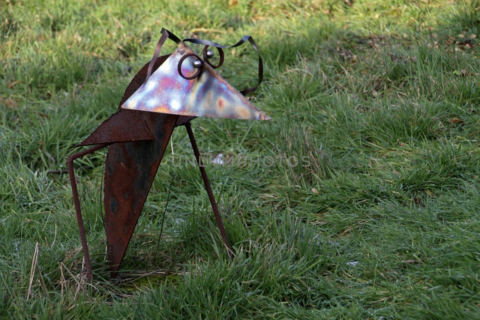 Metal bird in a garden in Extertal-Almena