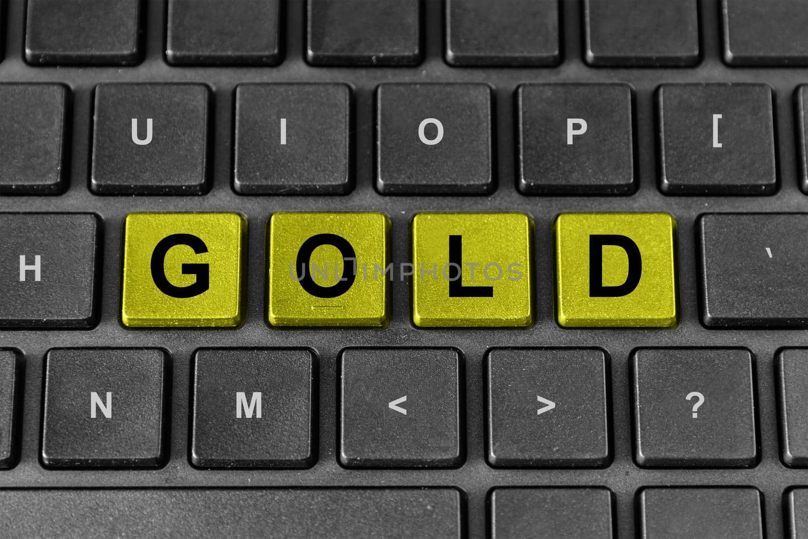 Gold word on keyboard, business concept