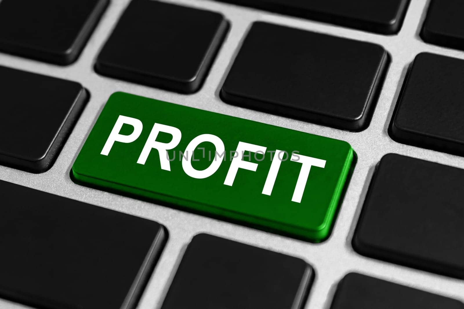 green profit button on keyboard, business financial concept