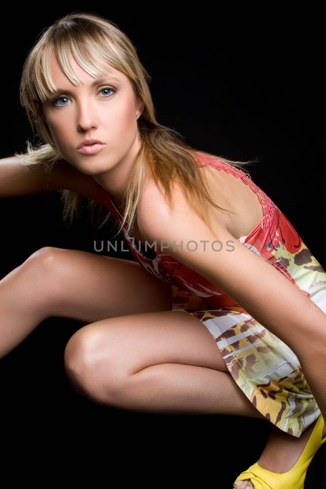 Beautiful blond fashion woman posing
