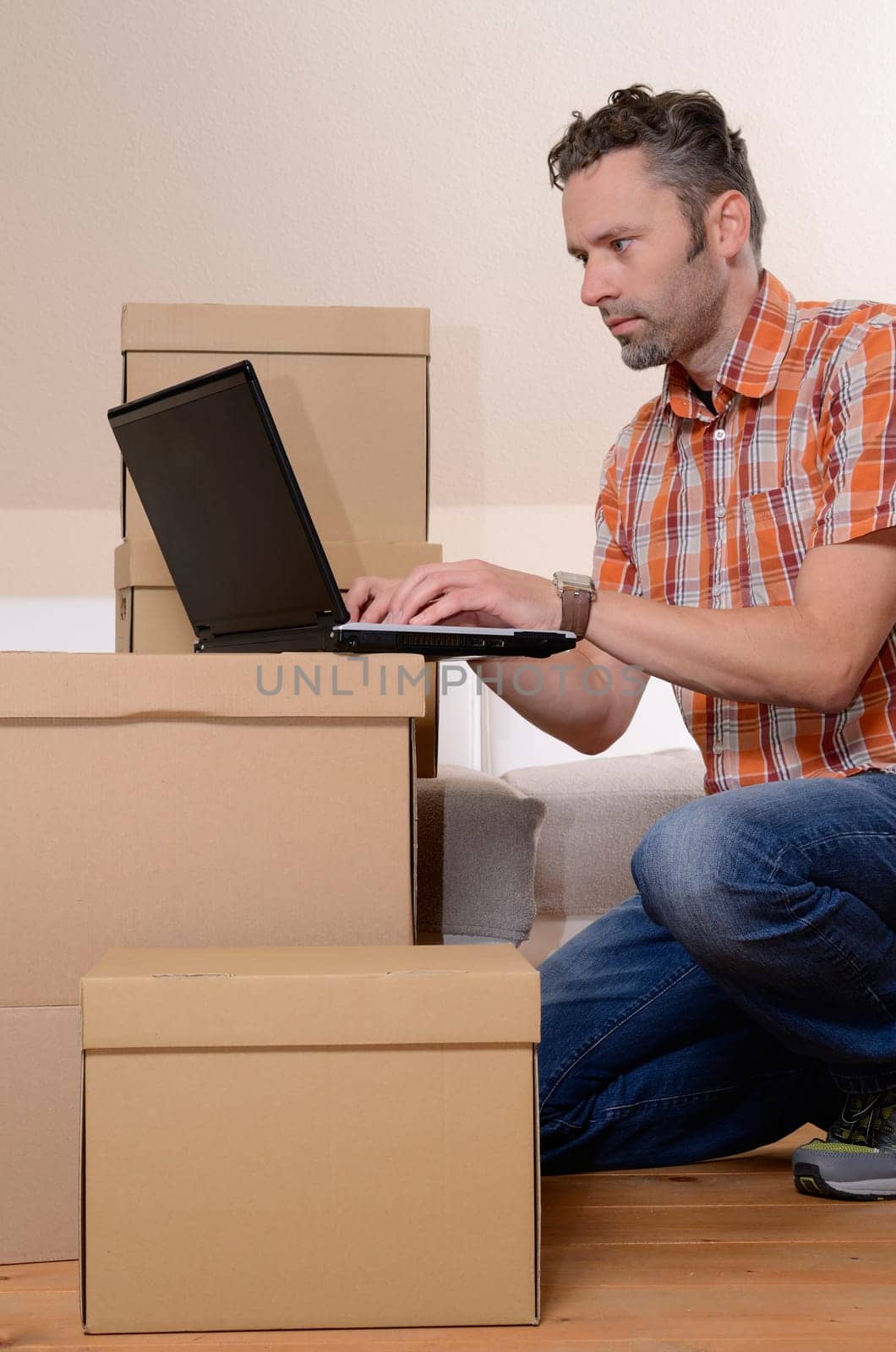 Happy man moving in new home
