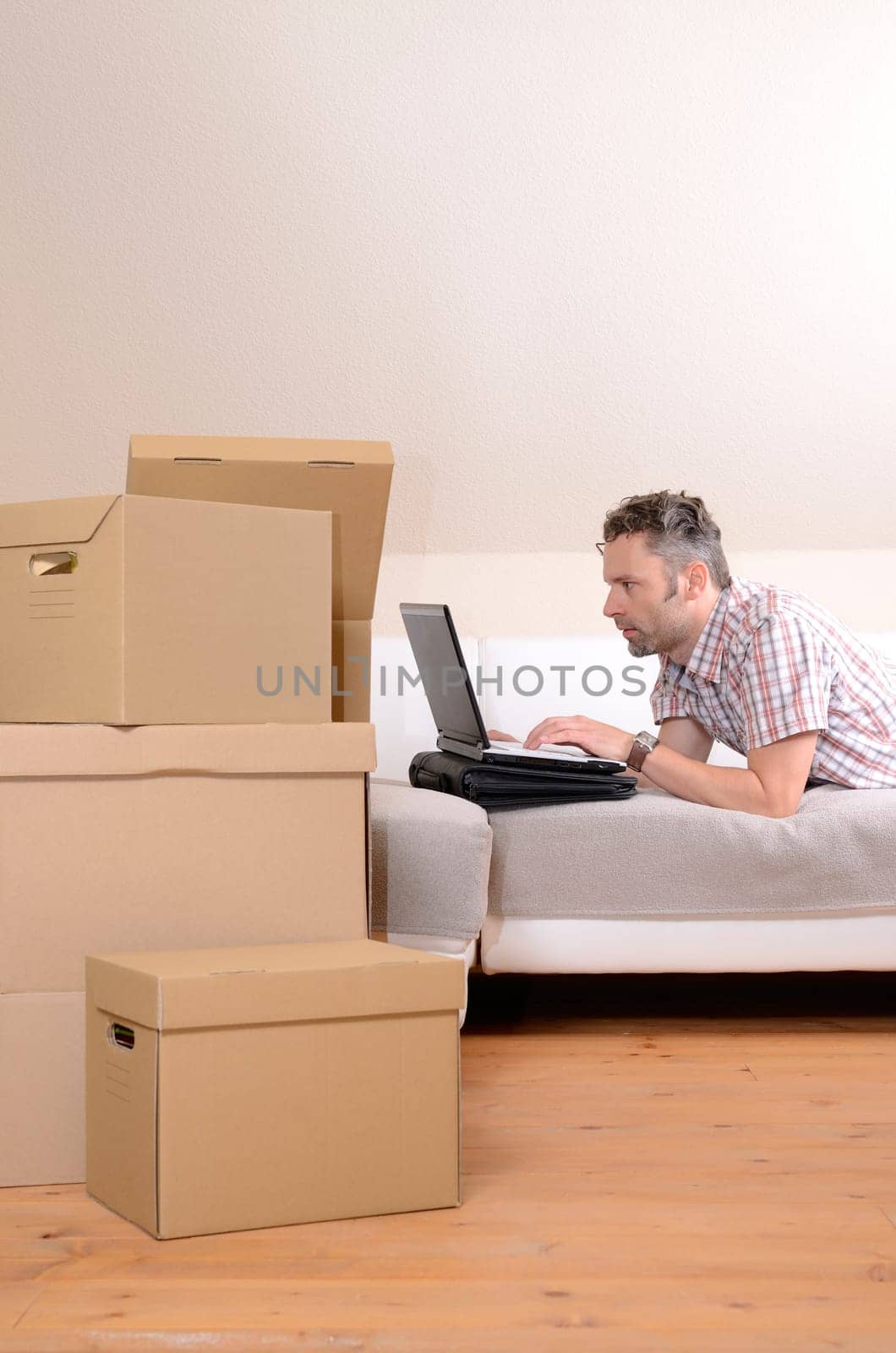 Happy man moving in new home