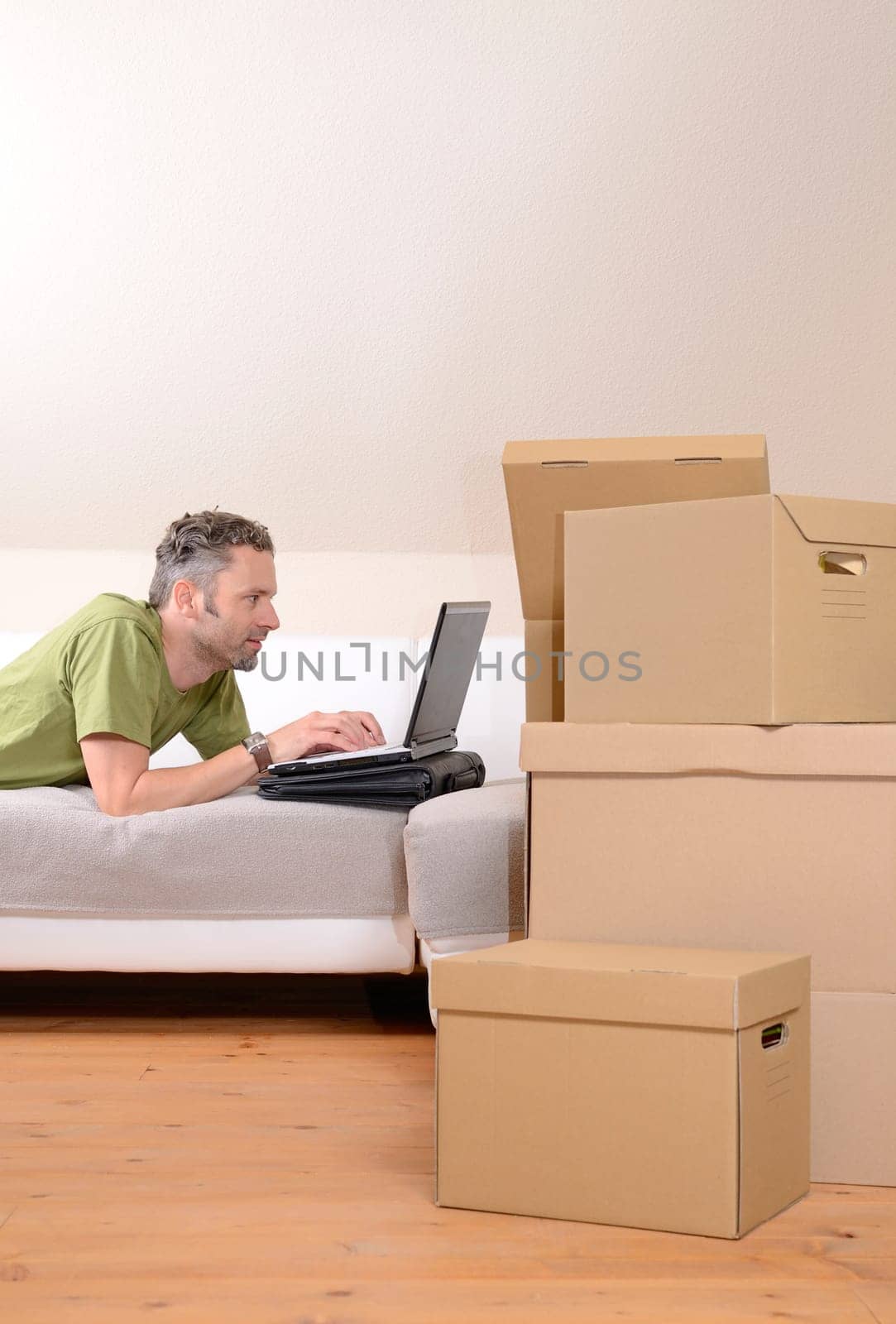 Happy man moving in new home