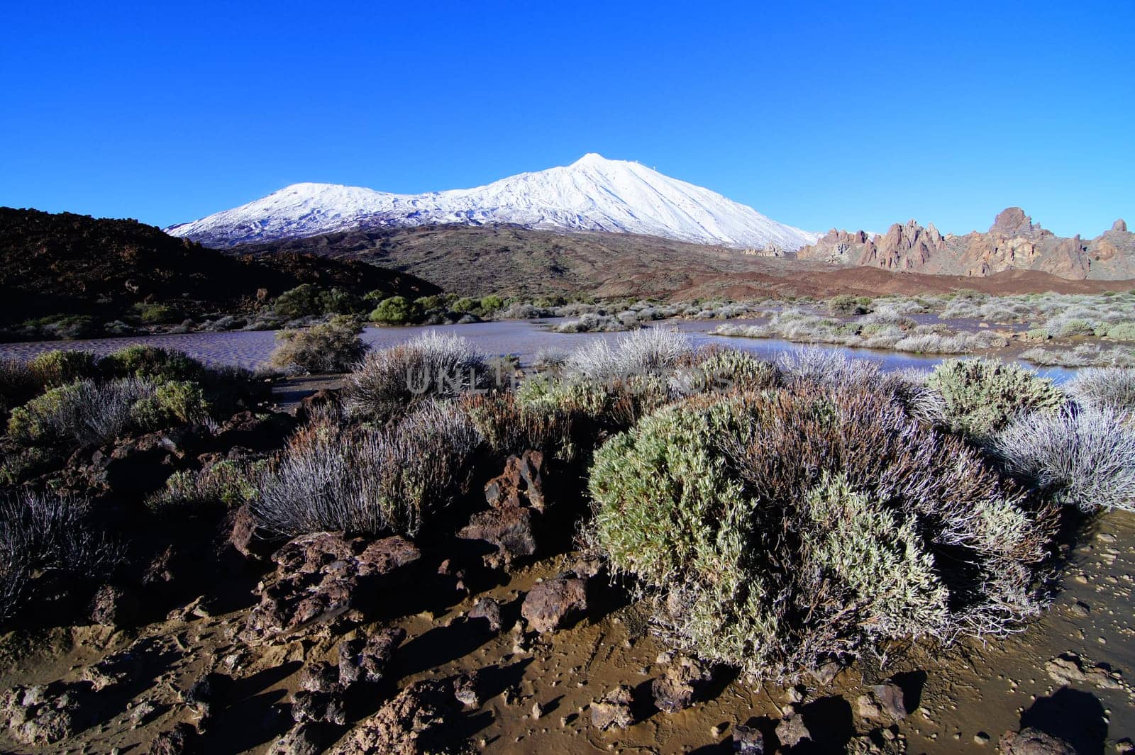 Backlight Sunbeams and Snow on Teide Tenerife Canary Islands