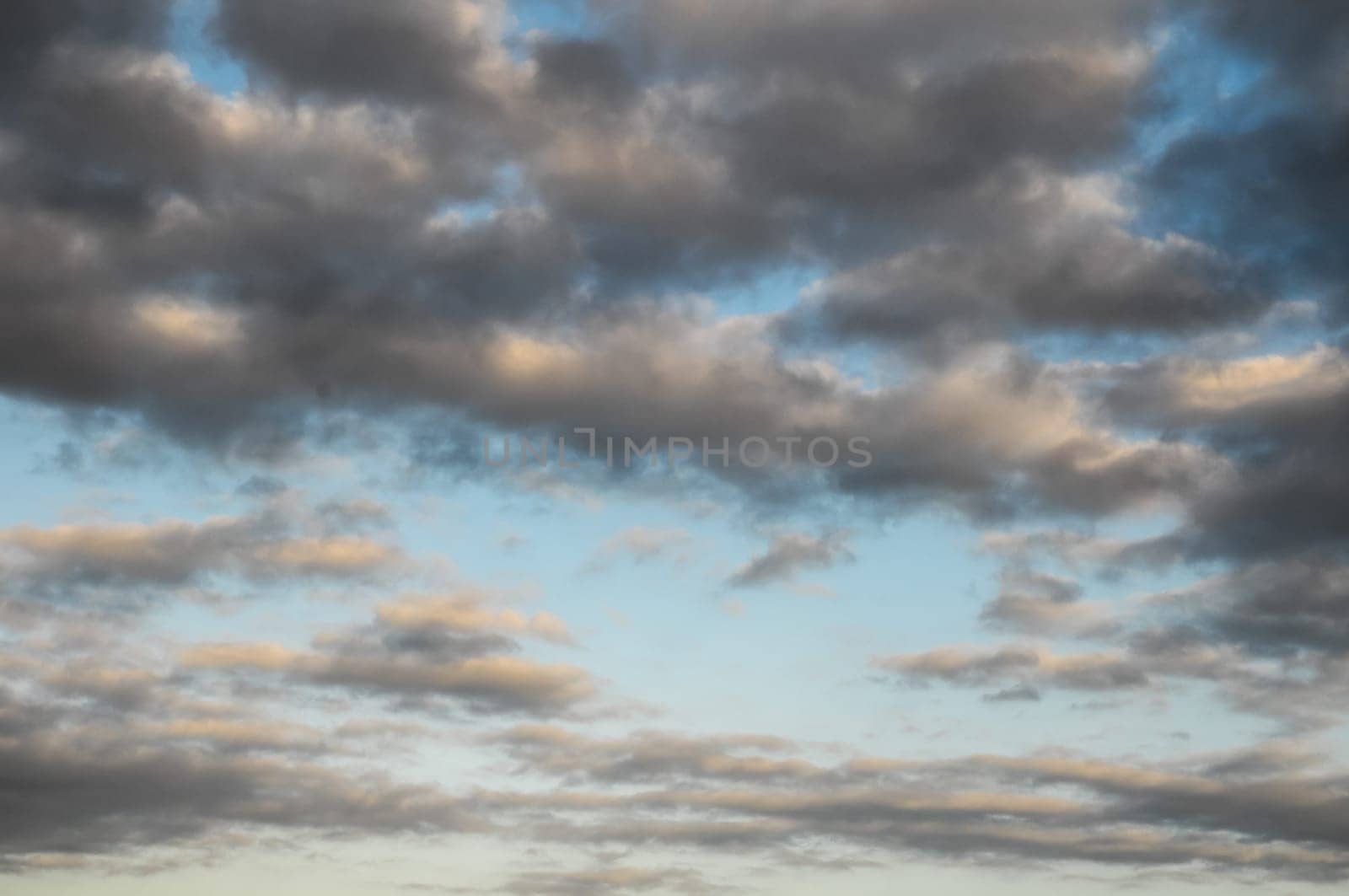 Cloudscape, Colored Clouds at Sunset near the Ocean