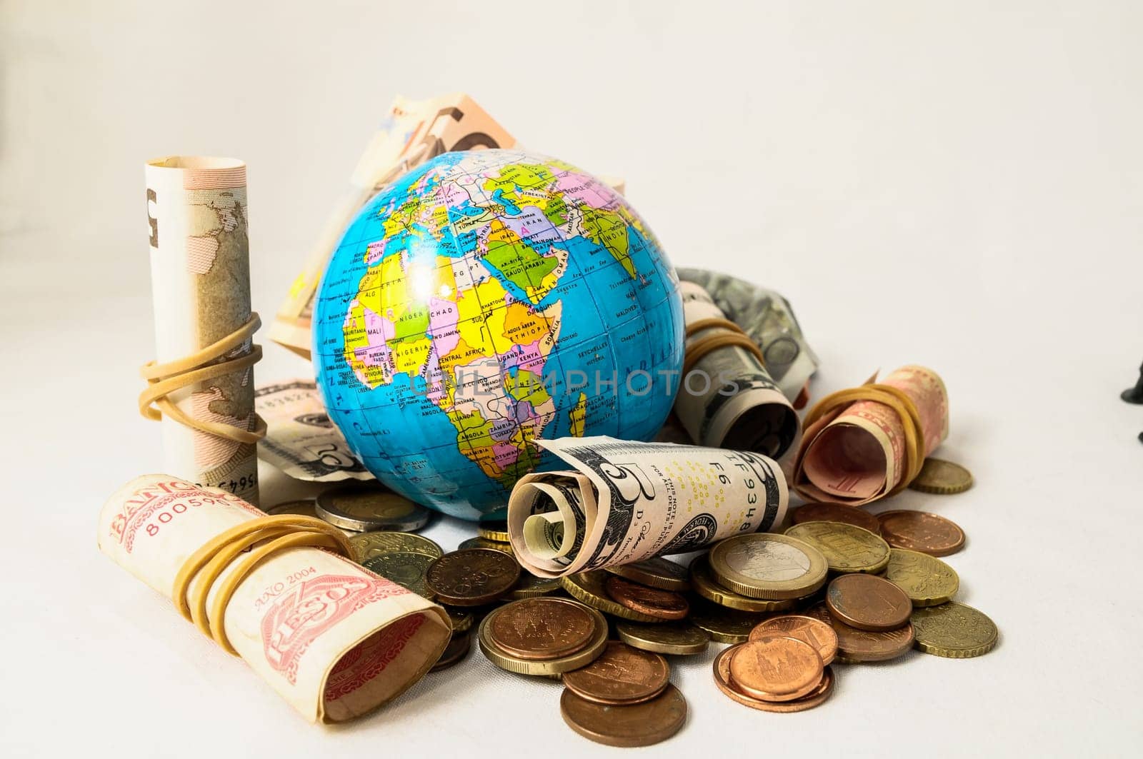 Globe Earth and Money on a White Background