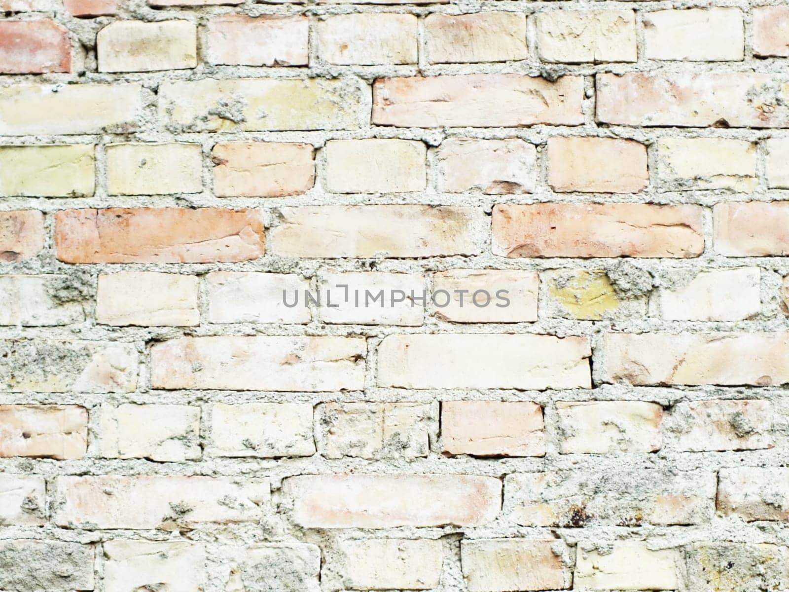 wall of small bricks stones as a background