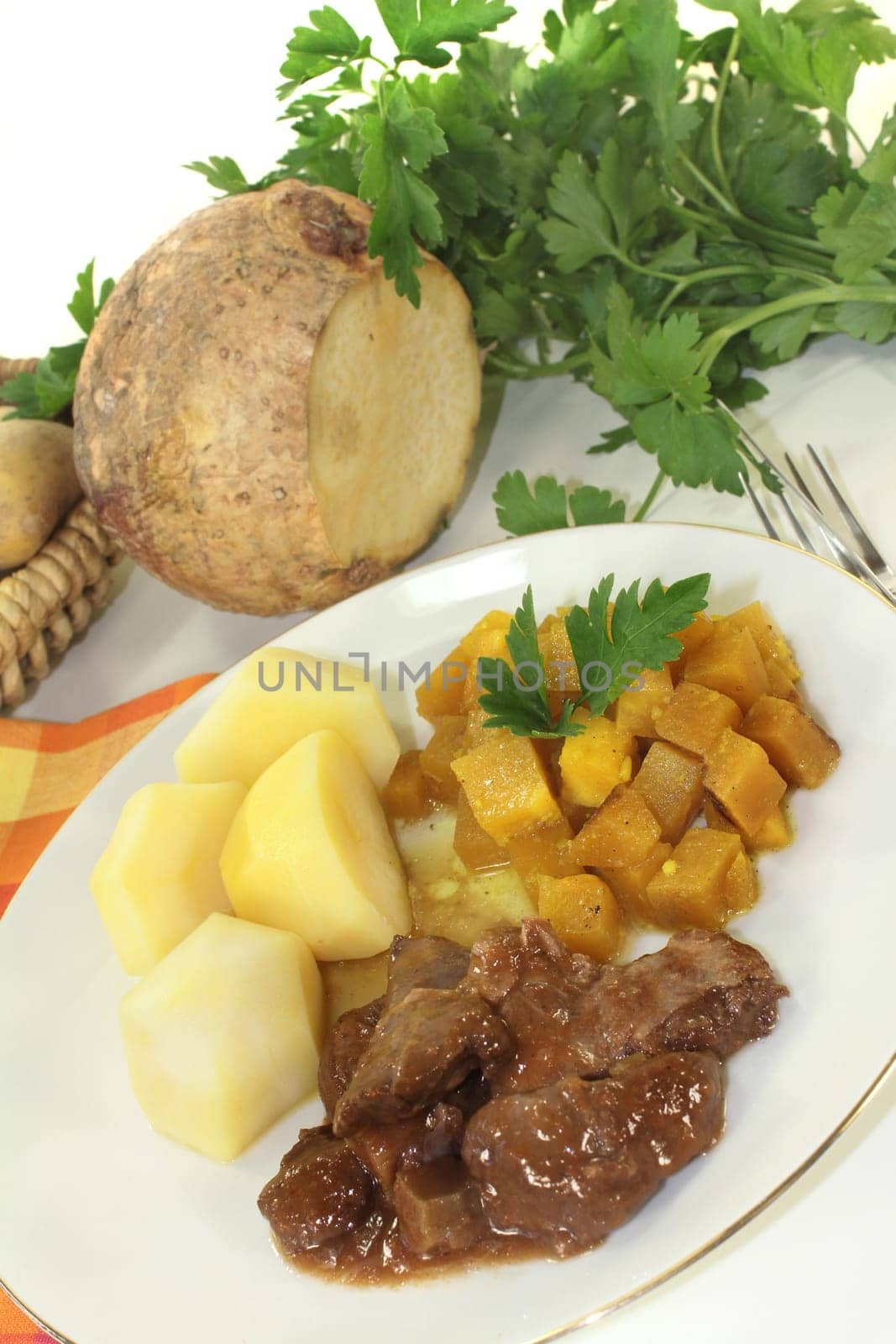 Wild goulash with turnip vegetables and potatoes