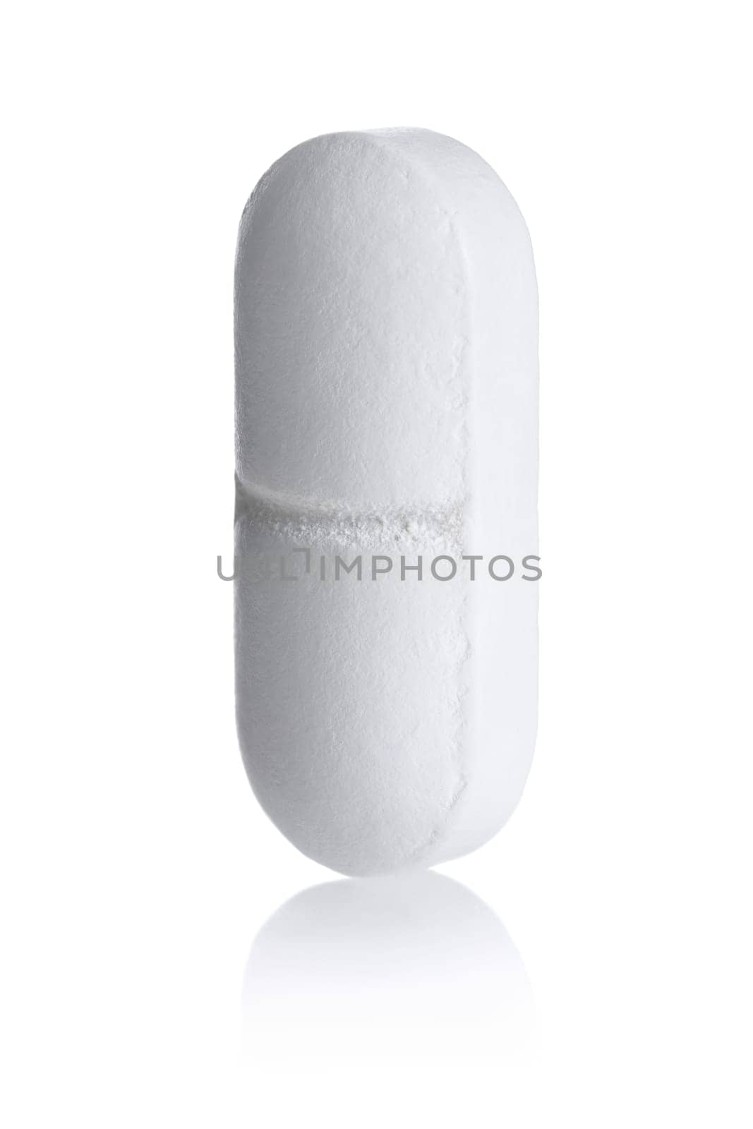 White tablet standing on white background,with reflection