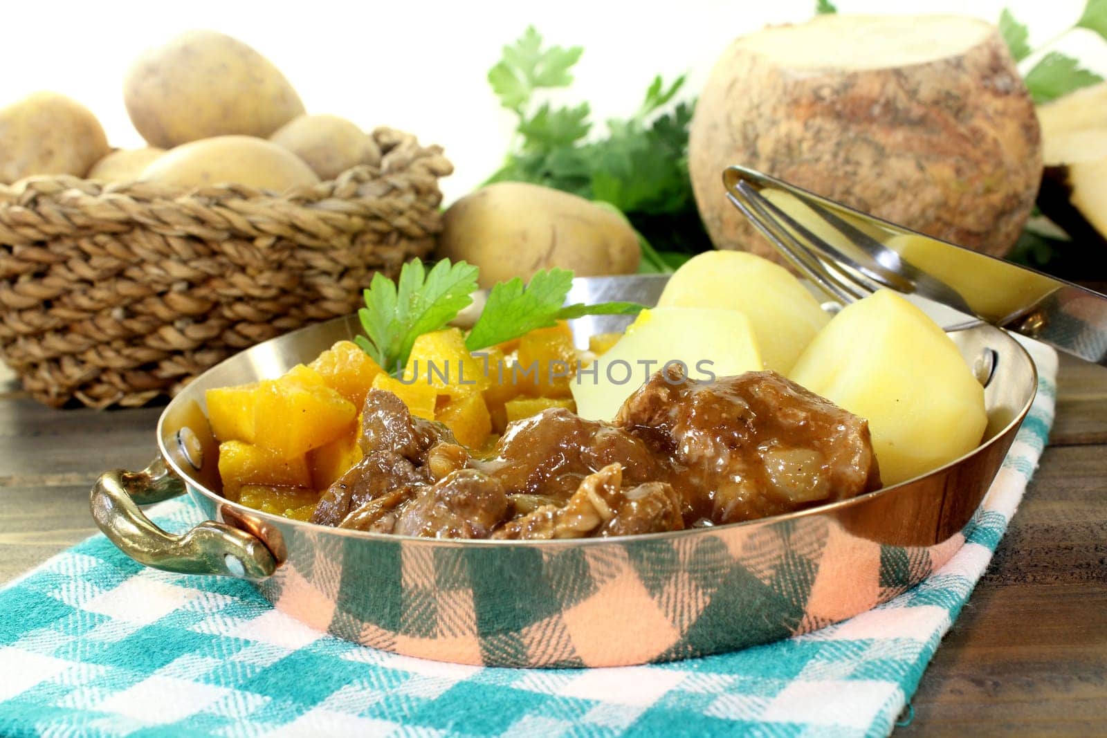 Wild goulash with turnip vegetables and potatoes