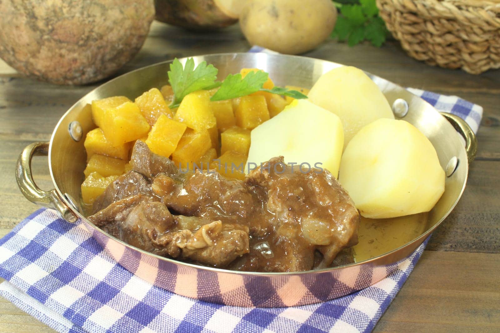 Wild goulash with turnip vegetables and potatoes