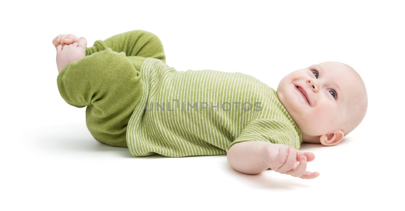 happy toddler isolated on white background. green clothing