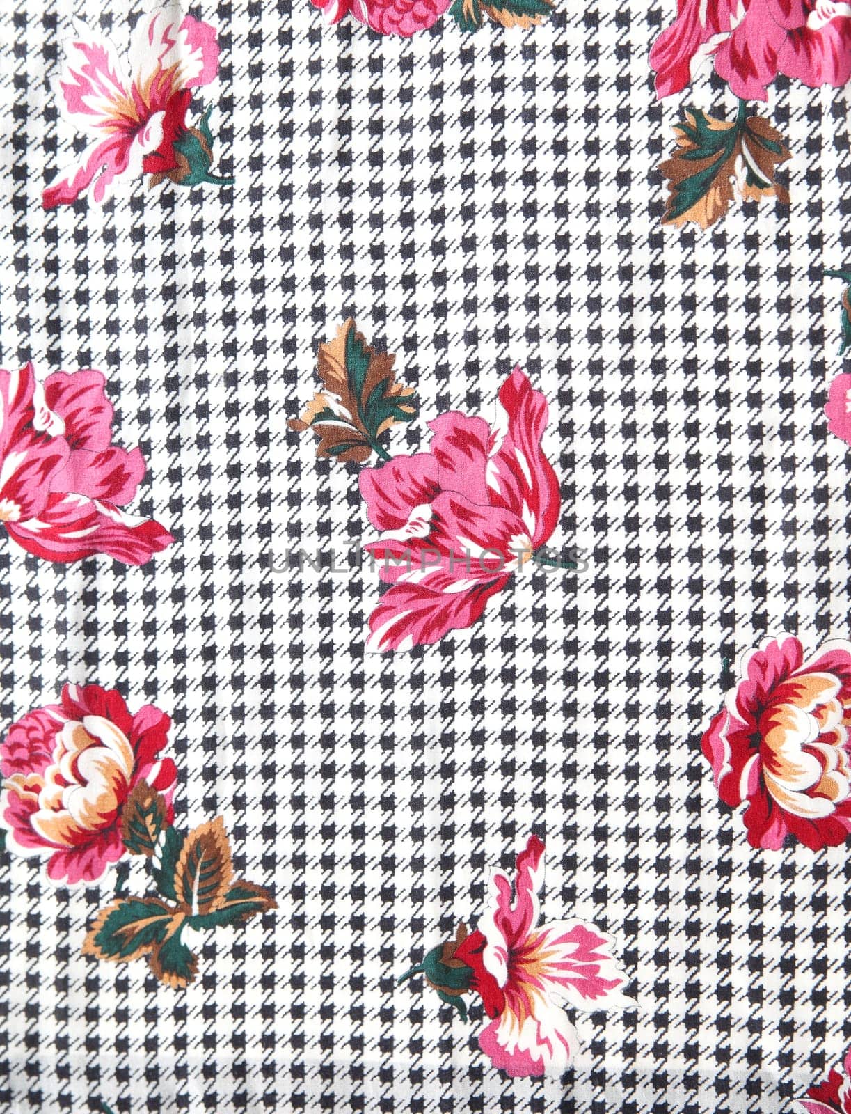 decorative flowers on a black and gray pattern background