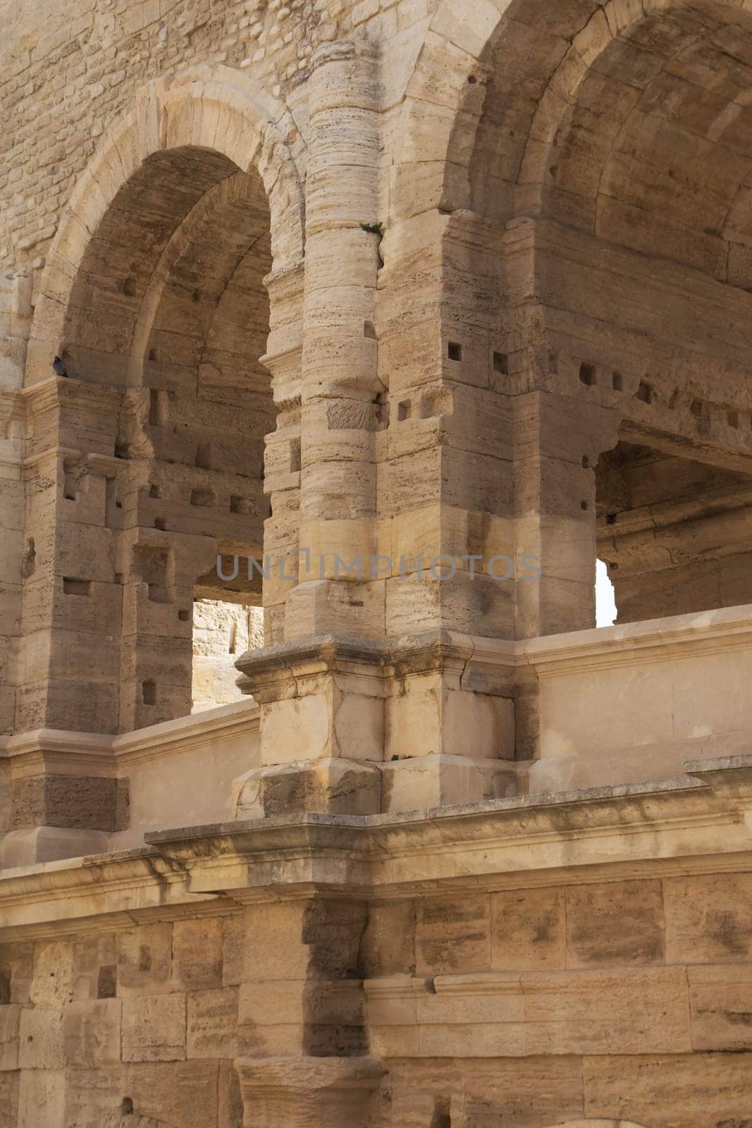 Detailed view of an old Roman amphitheater (Arles, Provence, France)