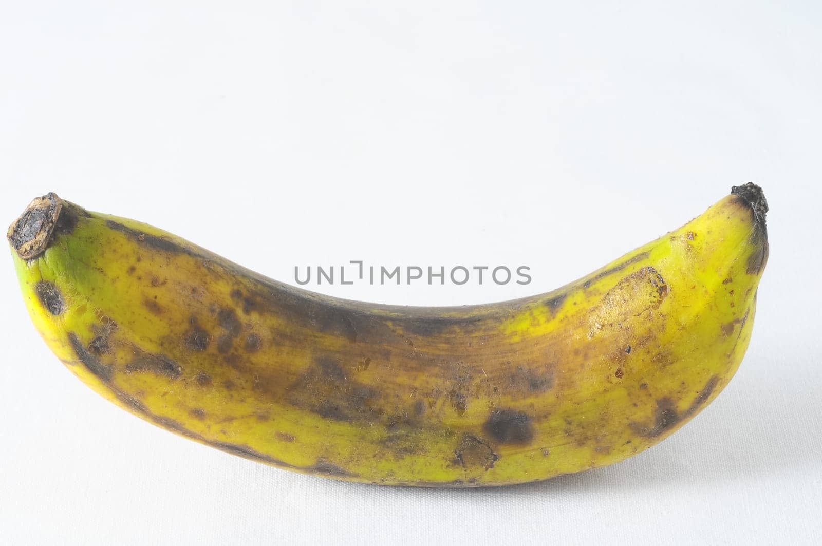 Very Ripe Healthy Banana on a White Background