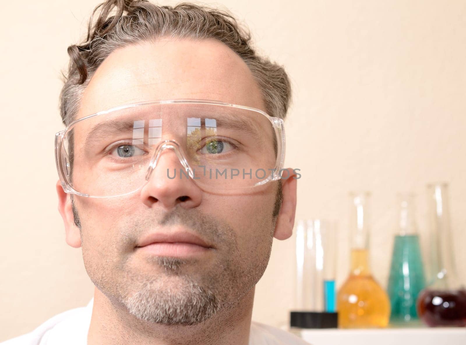 Mature male looking at camera at hospital, close up shot