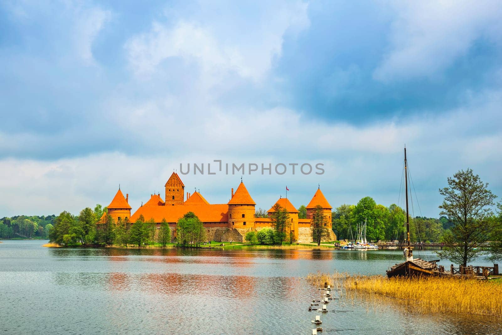 Panoramic view on Medieval old castle in Trakai, Lithuania placed on Galve lake..Island ancient castle are one of the most popular touristic destinations and cultural center in Lithuania.