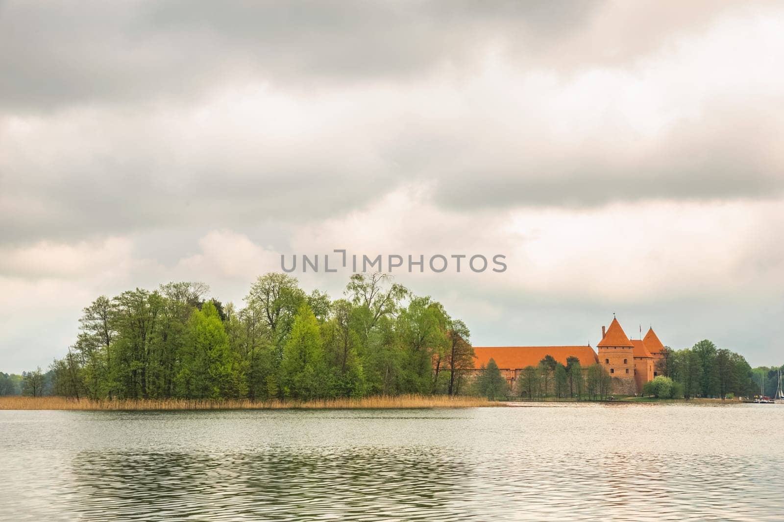 Panoramic view on Medieval old castle in Trakai, Lithuania placed on Galve lake..Island ancient castle are one of the most popular touristic destinations and cultural center in Lithuania.